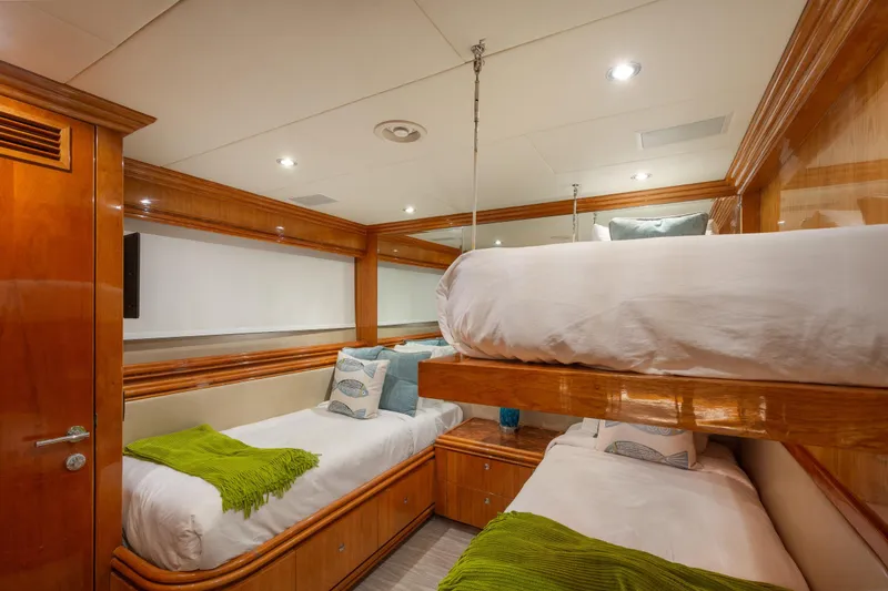 Slide: The Image of Luxurious 2006 Hargrave Raised Pilothouse yacht cabin with twin beds and elegant wood finish. - 45