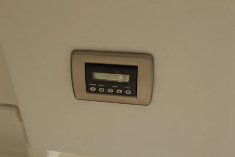 Slide: The Image of Control panel on 2017 Sea Ray Sundancer 350 Coupe boat interior. - 18