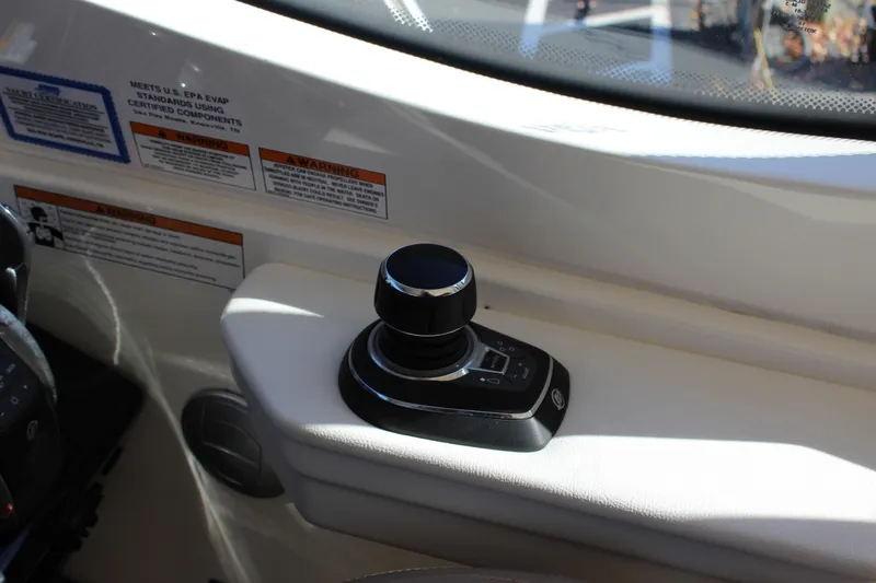 Slide: The Image of Joystick control on 2017 Sea Ray Sundancer 350 Coupe boat dashboard. - 25
