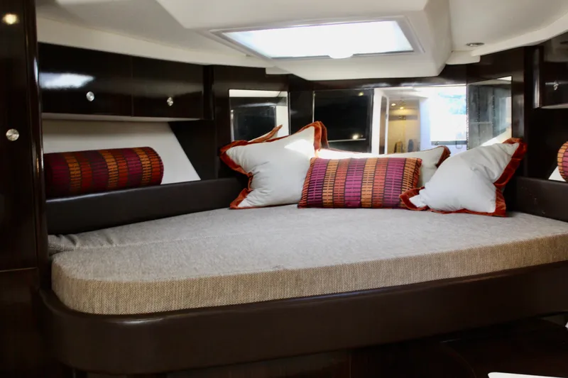 Slide: The Image of Luxurious cabin interior of 2017 Sea Ray Sundancer 350 Coupe with stylish bedding. - 33