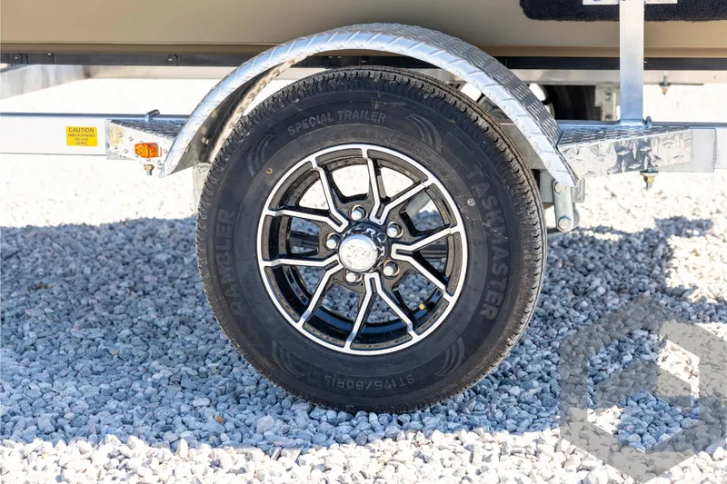 Slide: The Image of Trailer wheel of 2026 G3 1652 VBW on gravel surface. - 23