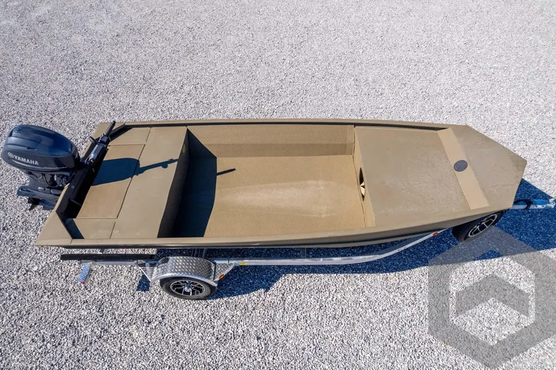 Slide: The Image of 2026 G3 1652 VBW boat on trailer with Yamaha motor, parked on gravel. - 44