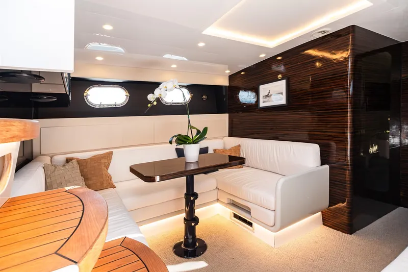 Slide: The Image of Luxurious interior of 2000 Magnum 50 Bestia yacht with elegant seating and modern decor. - 29