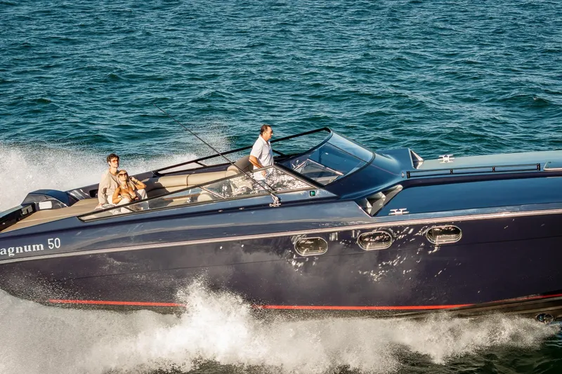 Slide: The Image of Luxury Magnum 50 Bestia yacht cruising on open water, 2000 model. - 4
