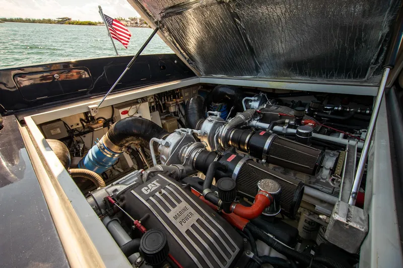 Slide: The Image of Engine compartment of 2000 Magnum 50 Bestia boat with CAT marine power. - 42