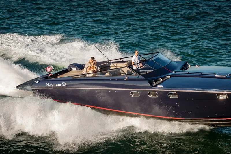 Slide: The Image of Luxury Magnum 50 Bestia yacht cruising on open water, 2000 model. - 5