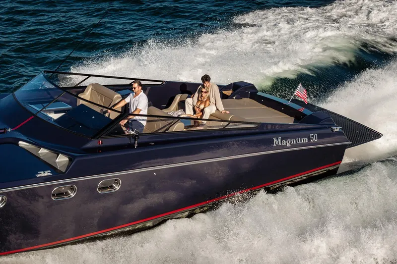 Slide: The Image of Luxury Magnum 50 Bestia yacht cruising on open water, 2000 model. - 9