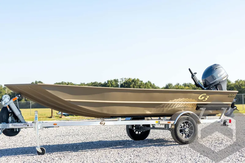 The Image of 2026 G3 1652 VBW boat on trailer, featuring sleek design and Yamaha outboard motor. - 1