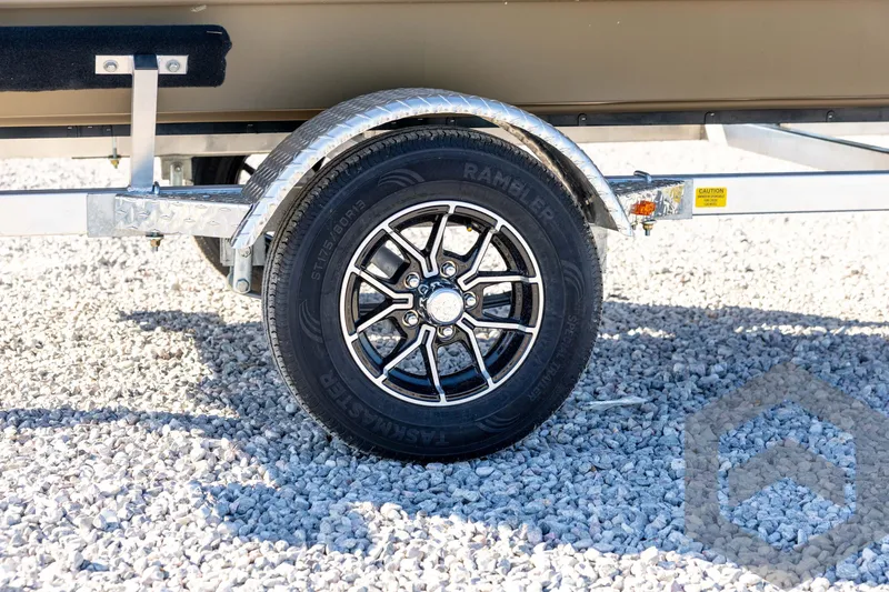 Slide: The Image of Trailer wheel of 2026 G3 1652 VBW on gravel surface. - 16