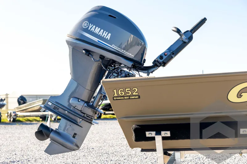 Slide: The Image of 2026 G3 1652 VBW boat with Yamaha outboard motor, displayed outdoors. - 17