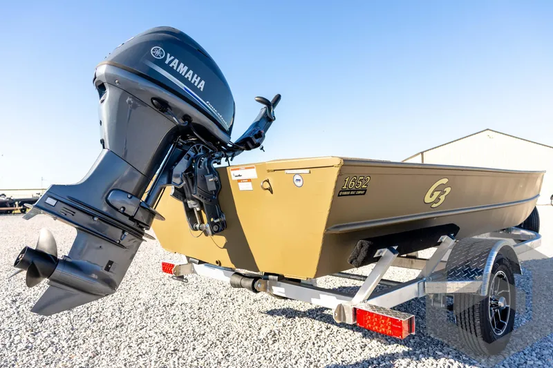 Slide: The Image of 2026 G3 1652 VBW boat with Yamaha outboard motor on a trailer. - 18