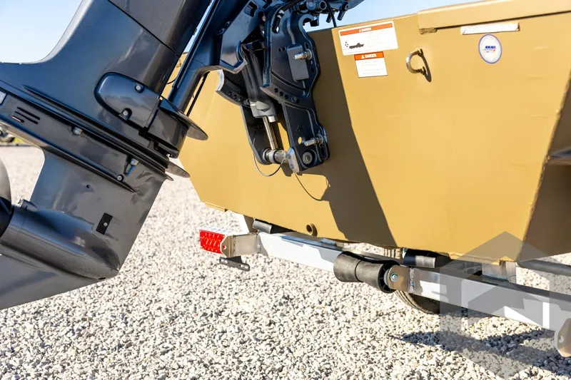 Slide: The Image of 2026 G3 1652 VBW boat motor and trailer on gravel surface. - 20