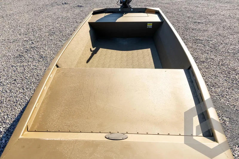 Slide: The Image of 2026 G3 1652 VBW boat on gravel, showcasing interior and deck design. - 29