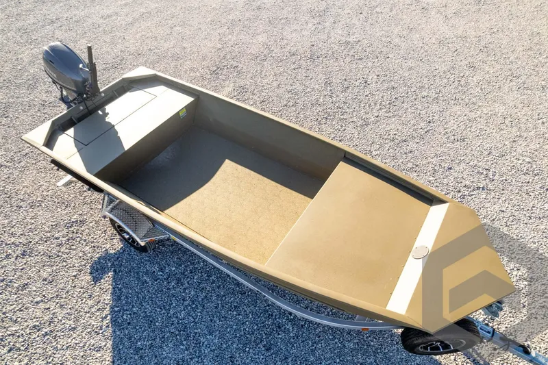 Slide: The Image of 2026 G3 1652 VBW boat on trailer, gravel background, overhead view. - 49