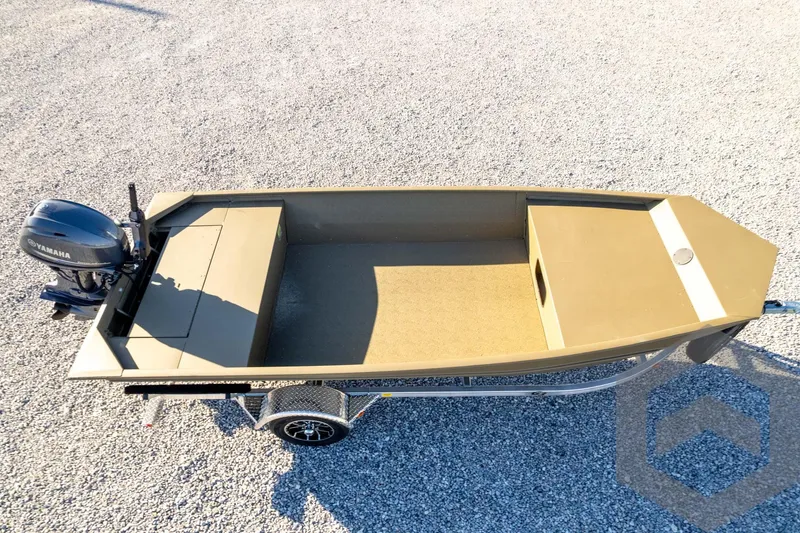 Slide: The Image of 2026 G3 1652 VBW boat on trailer with Yamaha outboard motor, parked on gravel. - 50