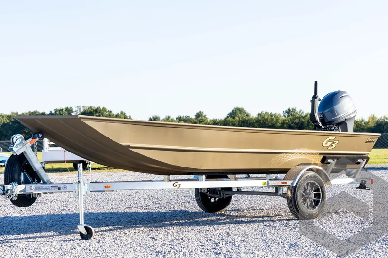 The Image of 2026 G3 1652 VBW boat on trailer, featuring sleek design and powerful outboard motor. - 1