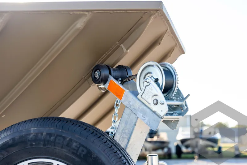 Slide: The Image of Trailer winch and tire of 2026 G3 1652 VBW boat, close-up view. - 11