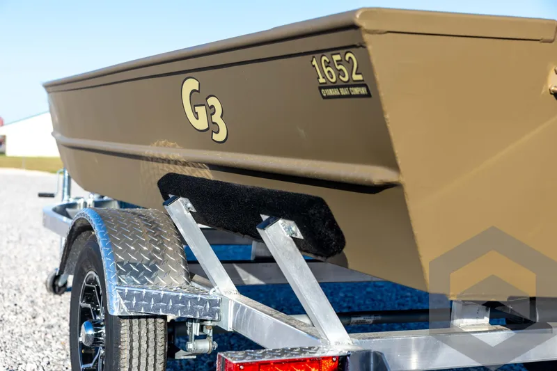 Slide: The Image of 2026 G3 1652 VBW boat on trailer, featuring durable design and sleek finish. - 22