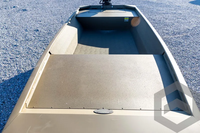Slide: The Image of 2026 G3 1652 VBW boat interior on gravel surface, showcasing spacious design. - 29