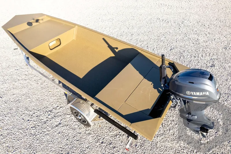 Slide: The Image of 2026 G3 1652 VBW boat with Yamaha outboard motor on gravel surface. - 44