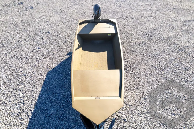 Slide: The Image of 2026 G3 1652 VBW boat on gravel, featuring a minimalist design and outboard motor. - 47