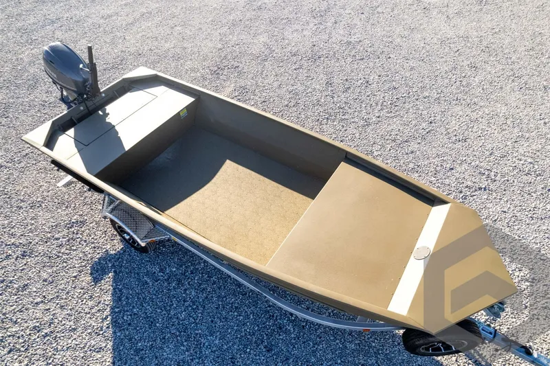 Slide: The Image of 2026 G3 1652 VBW boat on trailer, gravel background, overhead view. - 48