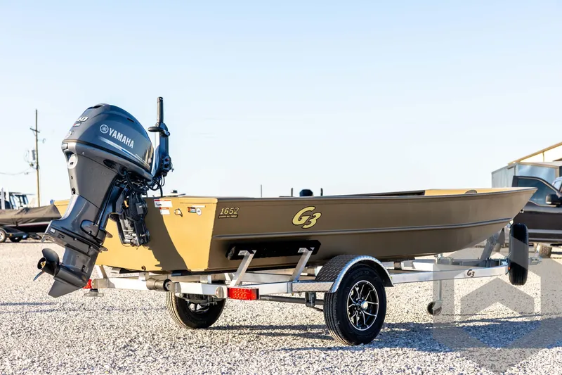 Slide: The Image of 2026 G3 1652 VBW boat with Yamaha outboard motor on a trailer. - 5
