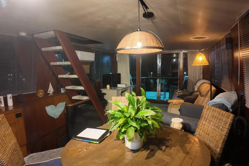 Slide: The Image of Cozy interior of 1987 Viking Gulfstar yacht with wooden decor and modern furnishings. - 17