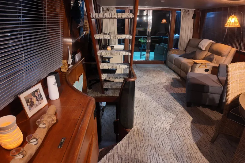 Slide: The Image of Luxurious interior of a 1987 Viking Gulfstar yacht with cozy seating and elegant decor. - 21