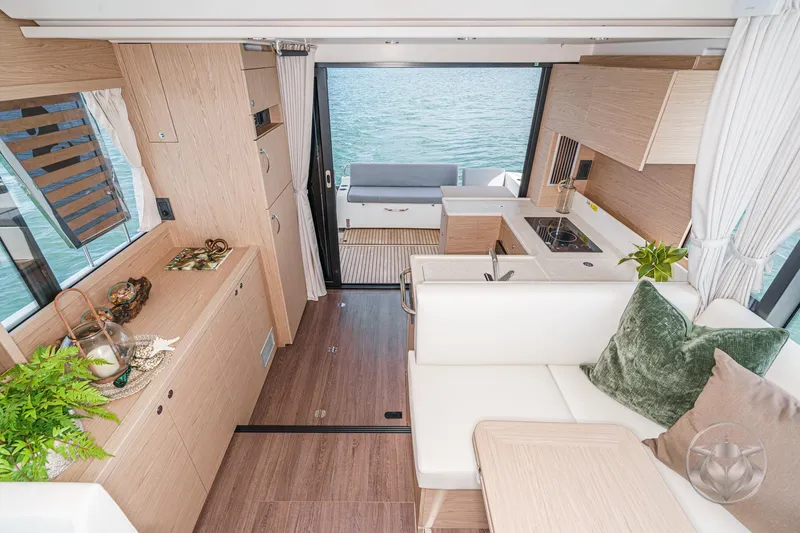 Slide: The Image of Luxurious interior of 2026 Beneteau Swift Trawler 41 Fly with modern decor and lake view. - 47