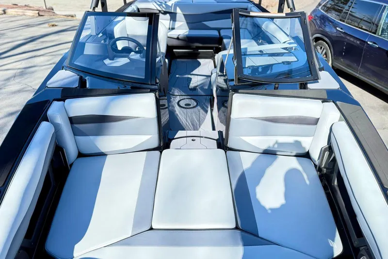 Slide: The Image of 2025 Axis A225 boat interior with sleek seating and modern design. - 4