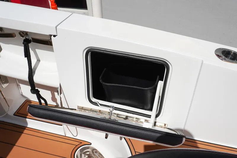 Slide: The Image of 2023 Renegade 38 GTS Open boat storage compartment with sleek design and teak flooring. - 11