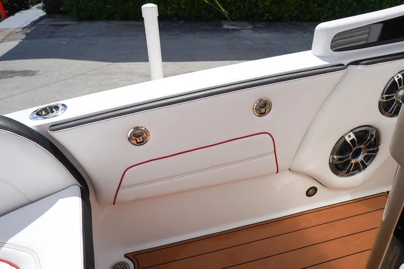 Slide: The Image of 2023 Renegade 38 GTS Open boat interior with white seating and speaker system. - 12