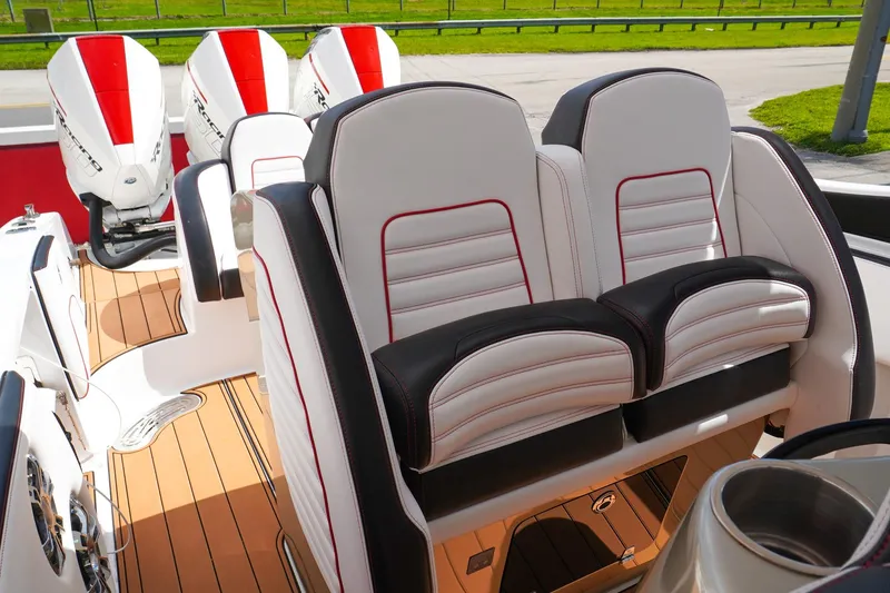 Slide: The Image of 2023 Renegade 38 GTS Open boat interior with luxurious seating and powerful engines. - 15