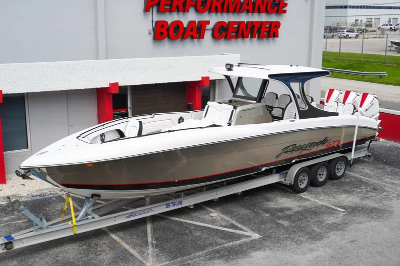 Slide: The Image of 2023 Renegade 38 GTS Open boat on trailer at Performance Boat Center. - 2