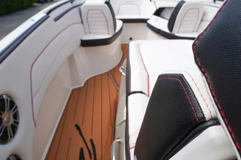 Slide: The Image of 2023 Renegade 38 GTS Open boat interior with stylish seating and wood-like flooring. - 24