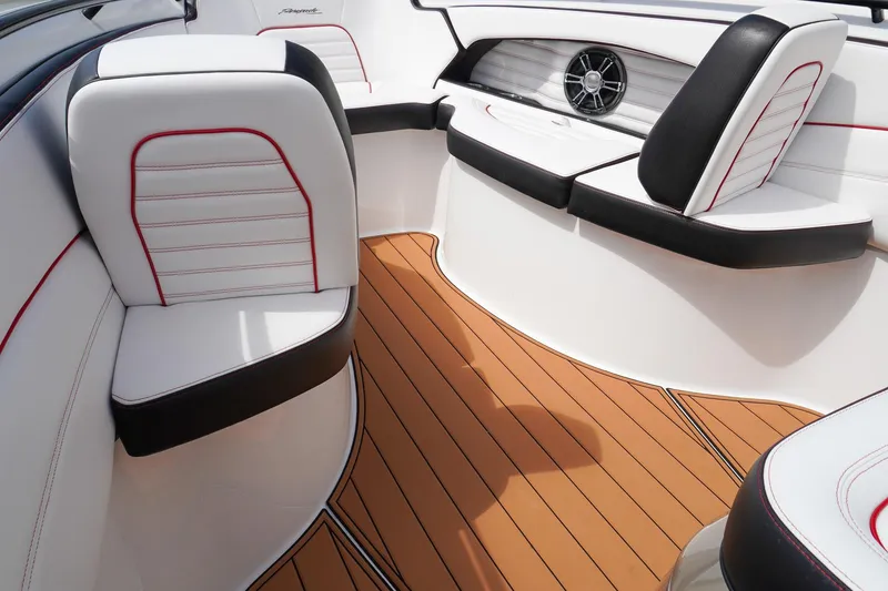 Slide: The Image of 2023 Renegade 38 GTS Open boat interior with white and black seating, teak flooring. - 29