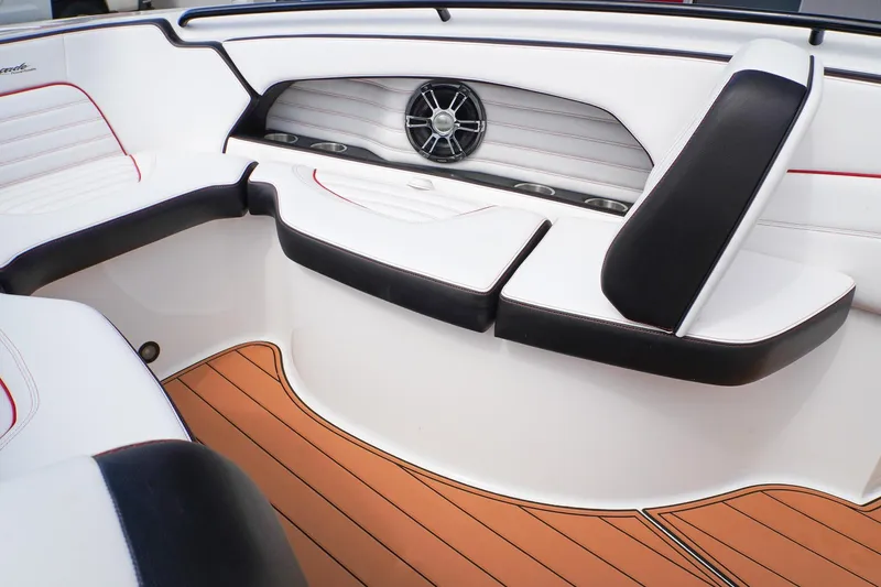 Slide: The Image of 2023 Renegade 38 GTS Open boat interior with white seating and wood-style flooring. - 30