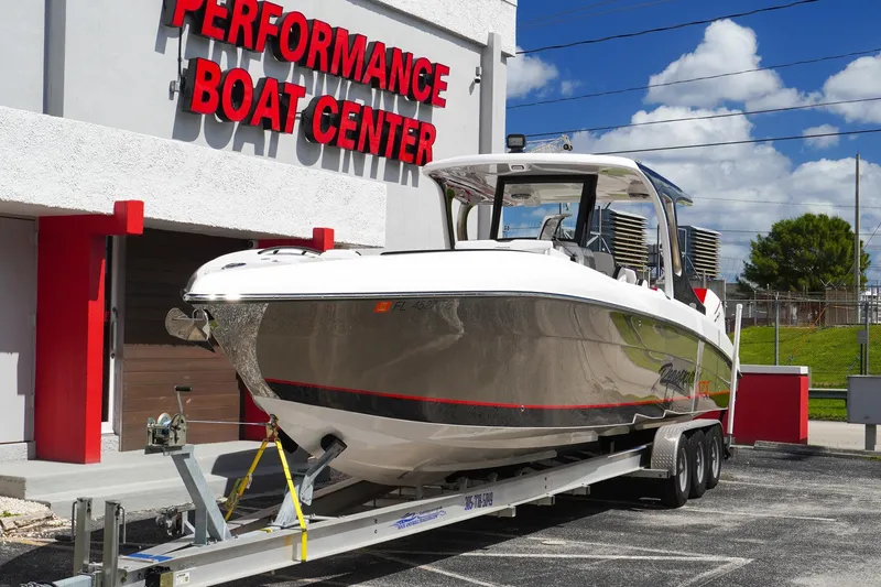 Slide: The Image of 2023 Renegade 38 GTS Open boat on trailer at Performance Boat Center. - 6