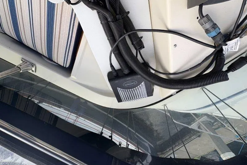 Slide: The Image of 1987 Tollycraft 34 Sundeck Motor Yacht wiring and striped seating detail. - 18