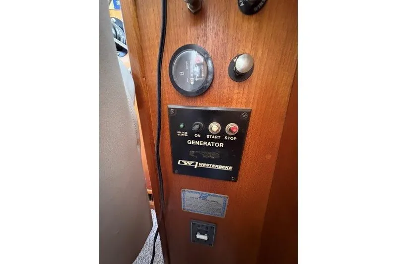 Slide: The Image of Control panel of a 1987 Tollycraft 34 Sundeck Motor Yacht with Westerbeke generator. - 29