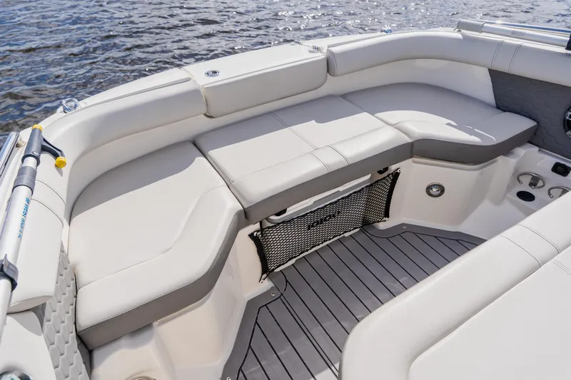 Slide: The Image of Luxurious seating on 2021 Sea Ray SDX 250 Outboard boat, with water view. - 23