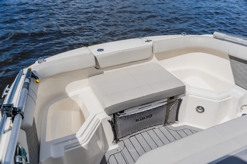 Slide: The Image of 2021 Sea Ray SDX 250 Outboard boat interior with comfortable seating and storage. - 28