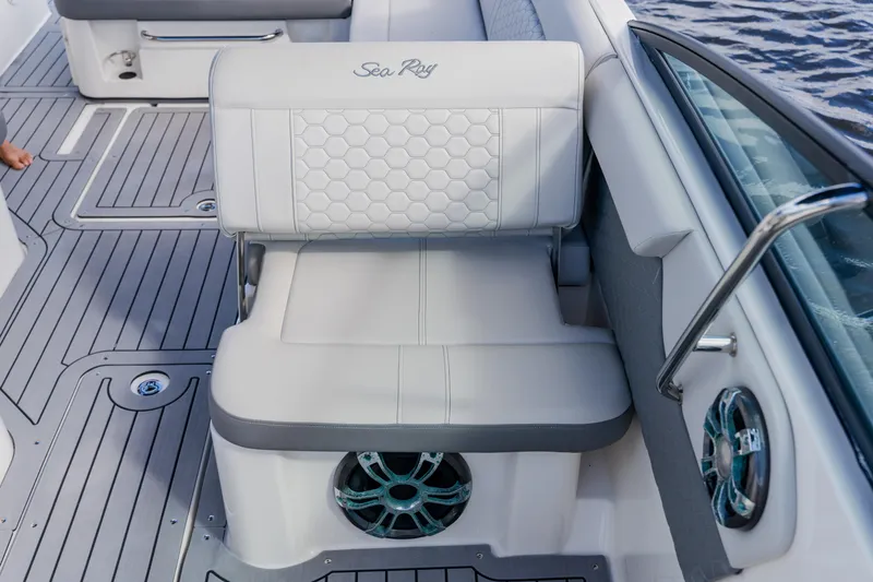 Slide: The Image of Luxurious seating on 2021 Sea Ray SDX 250 Outboard boat with stylish design and speaker system. - 56