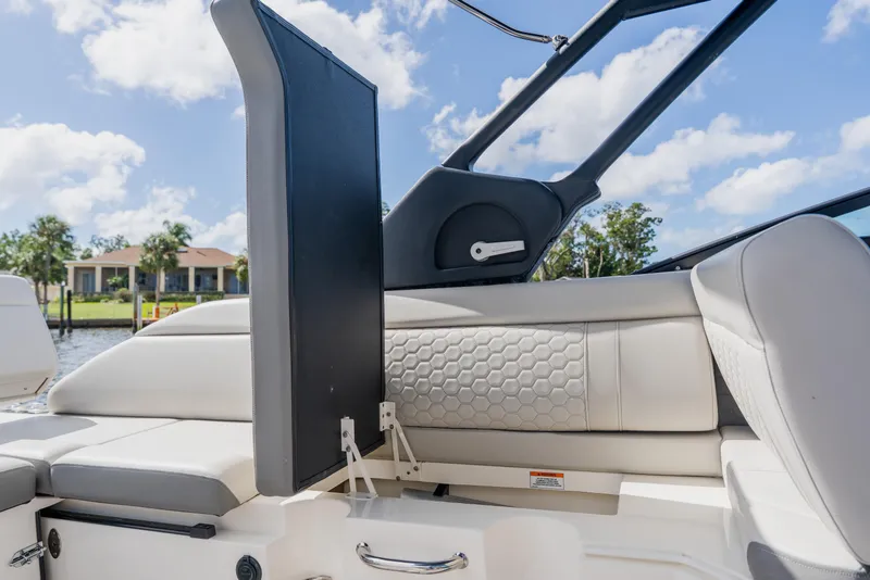 Slide: The Image of 2021 Sea Ray SDX 250 Outboard boat interior with luxurious seating and modern design. - 64