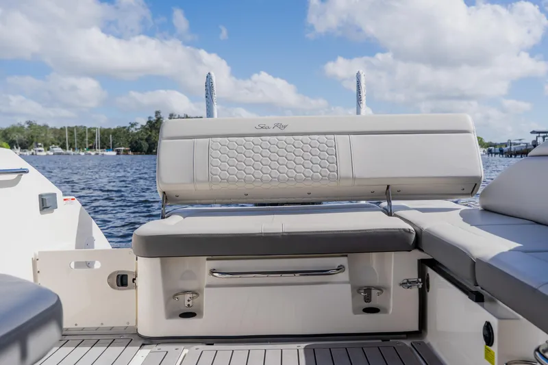 Slide: The Image of 2021 Sea Ray SDX 250 Outboard boat interior with comfortable seating and scenic water view. - 66