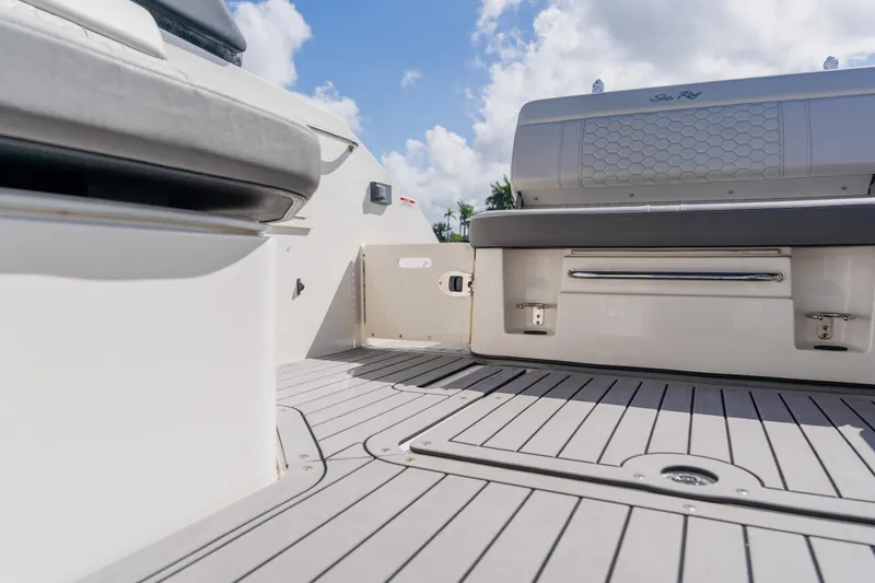 Slide: The Image of 2021 Sea Ray SDX 250 Outboard boat interior with sleek seating and modern design. - 69