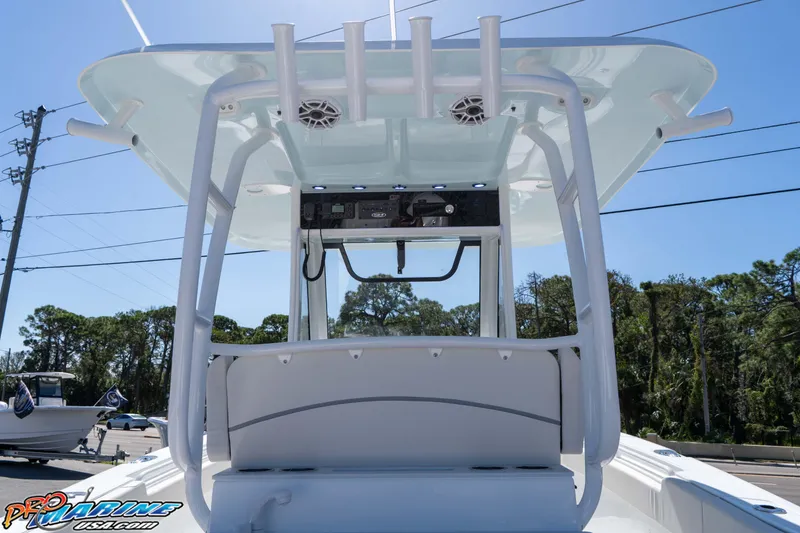 Slide: The Image of 2026 Sea Hunt Ultra 305 Coffin Box boat with T-top and rod holders. - 27
