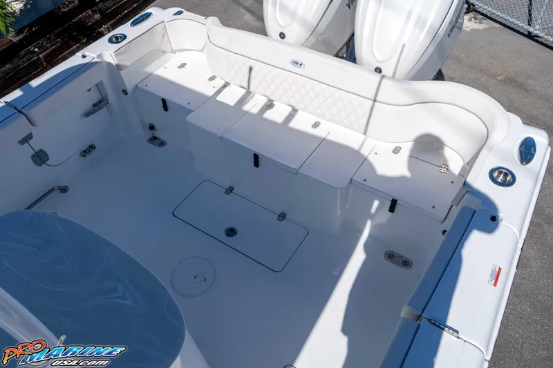 Slide: The Image of Sea Hunt Ultra 305 Coffin Box 2026 boat interior with seating and storage compartments. - 29