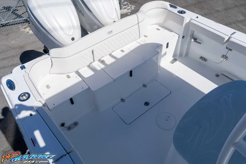 Slide: The Image of 2026 Sea Hunt Ultra 305 Coffin Box boat interior with seating and storage compartments. - 30